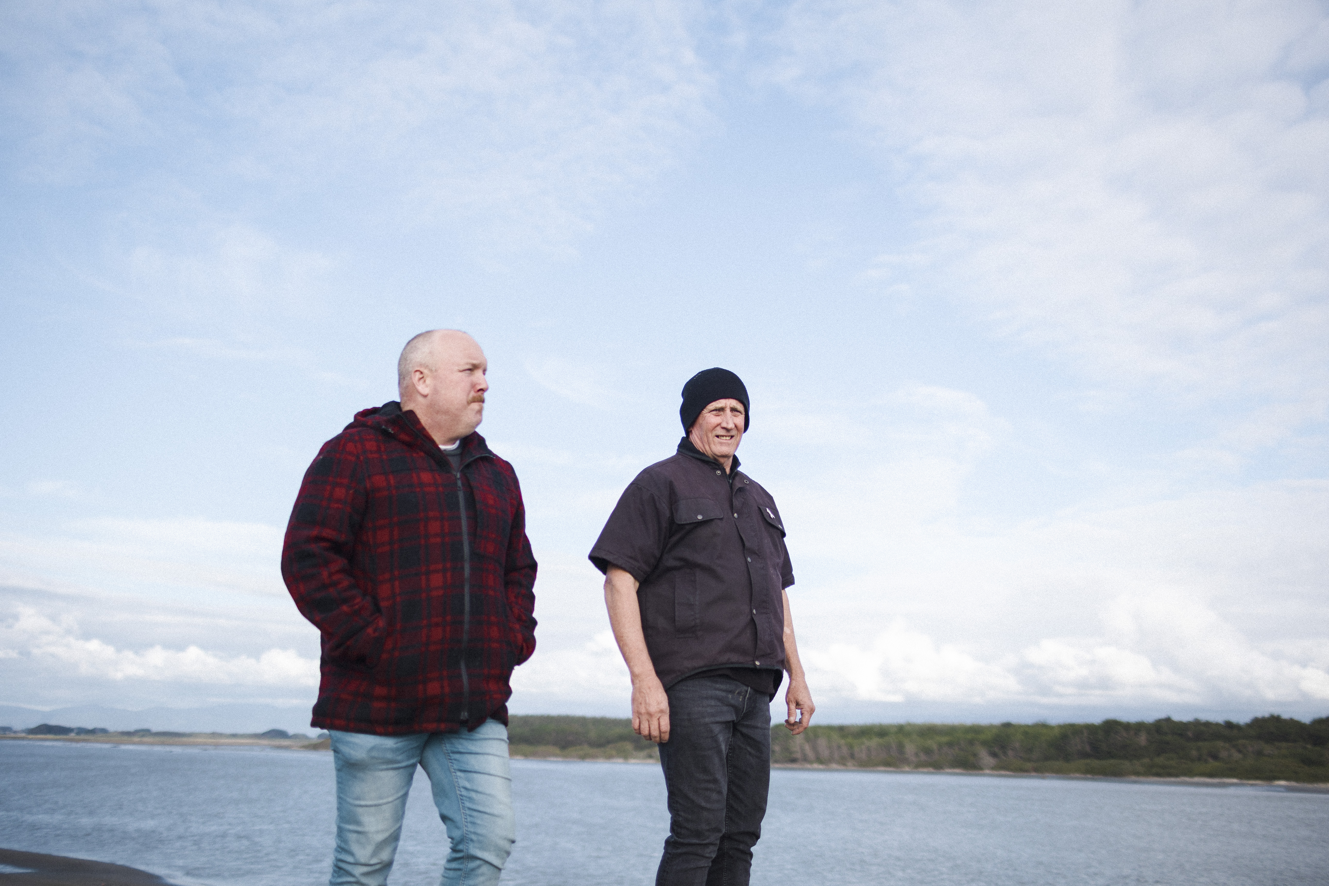 Two Men walking on the beach